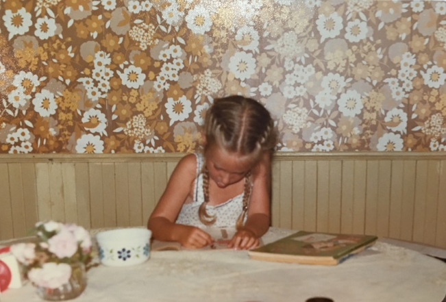 a young child colouring